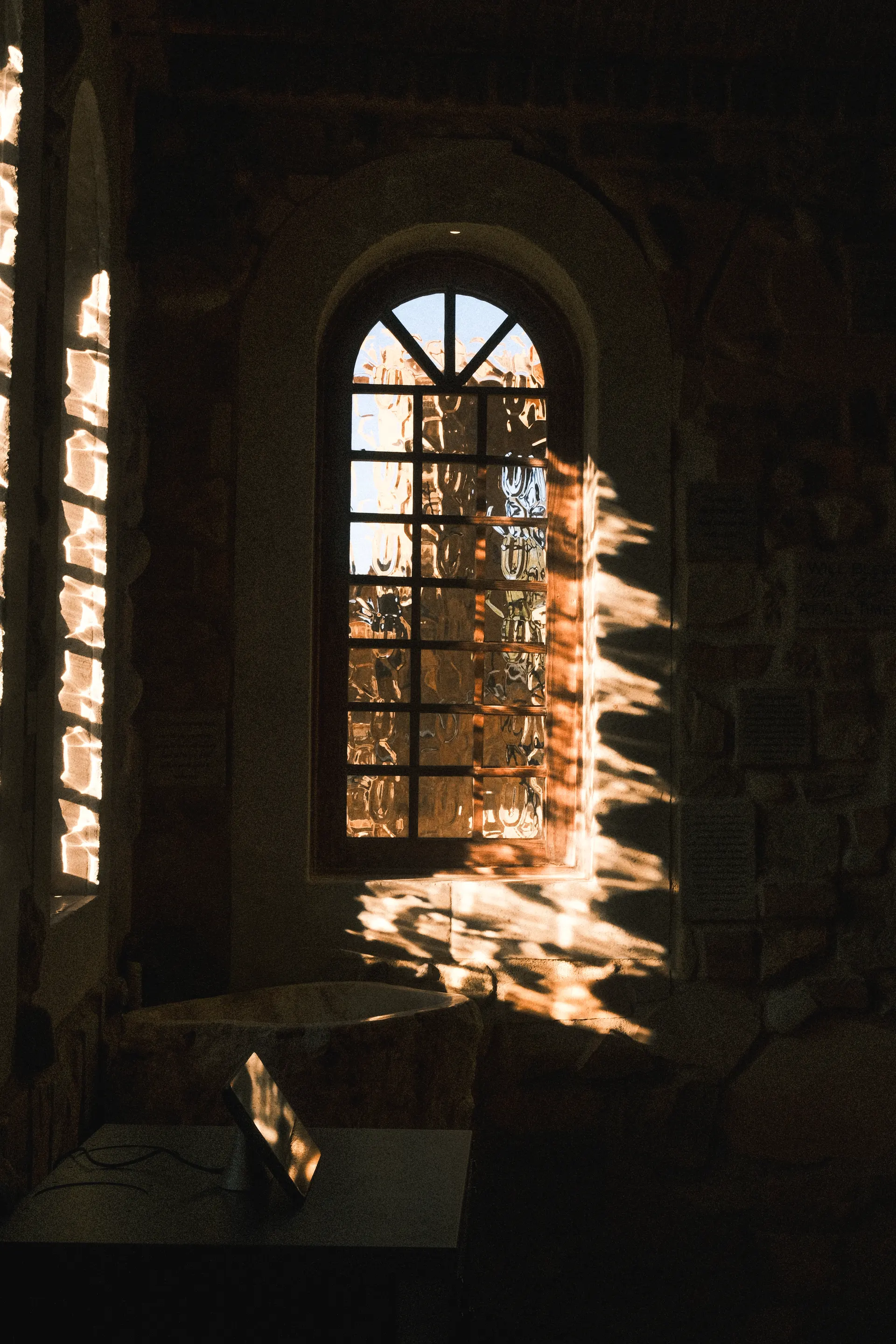 Interior of the Zion Chapel at The Hidden Encounter, stone walls and warm light